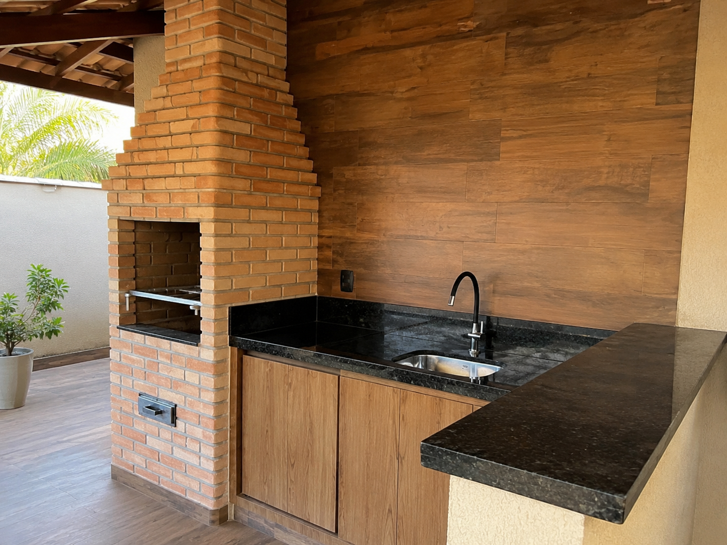 Área gourmet com bancada em granito